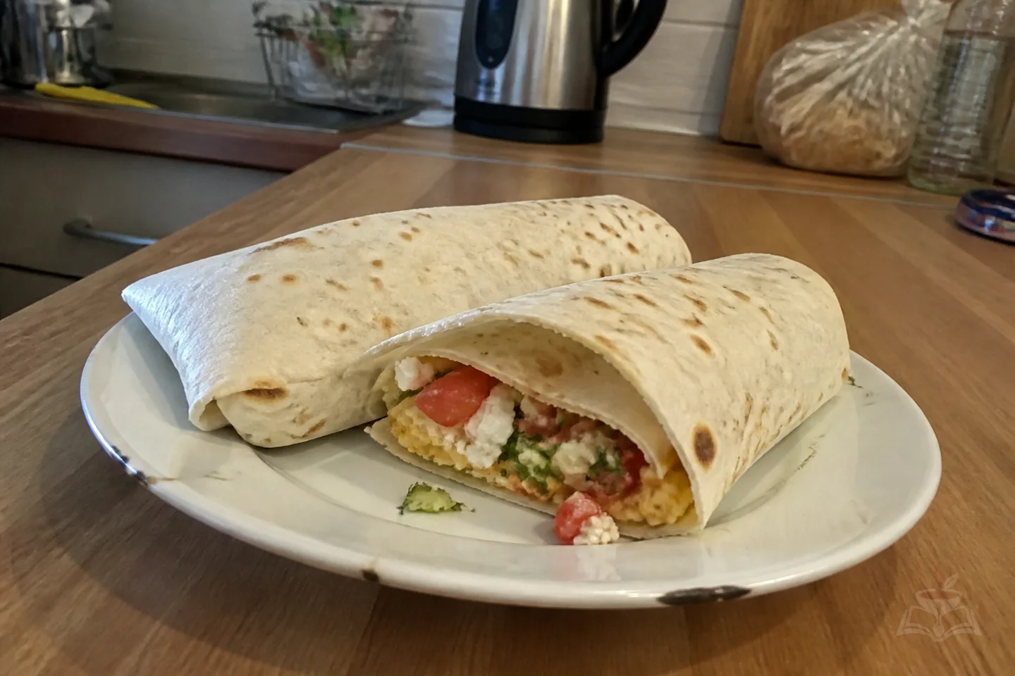 Armenian brtuch lavash wraps with egg cheese vegetables and herbs