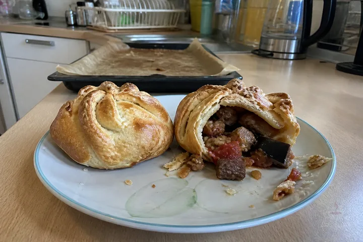 Armenian khurjin pastry parcels filled with lamb vegetables and herbs