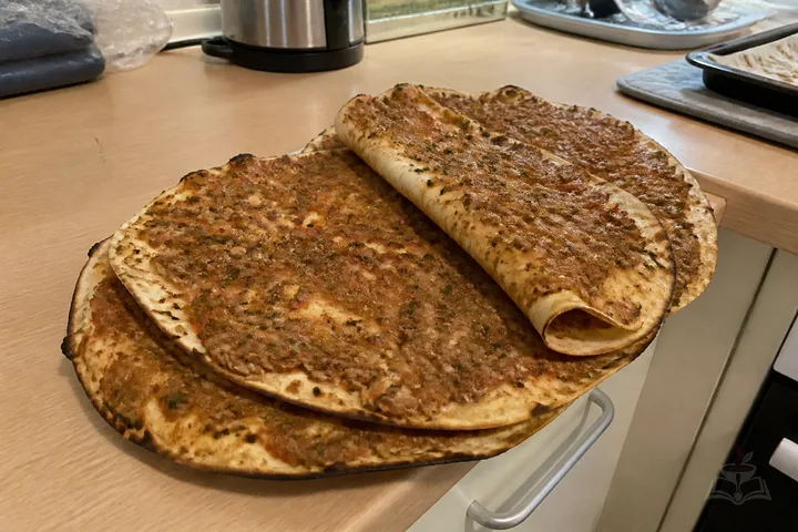 Armenian lahmajo thin meat flatbreads with lemon herbs and vegetables
