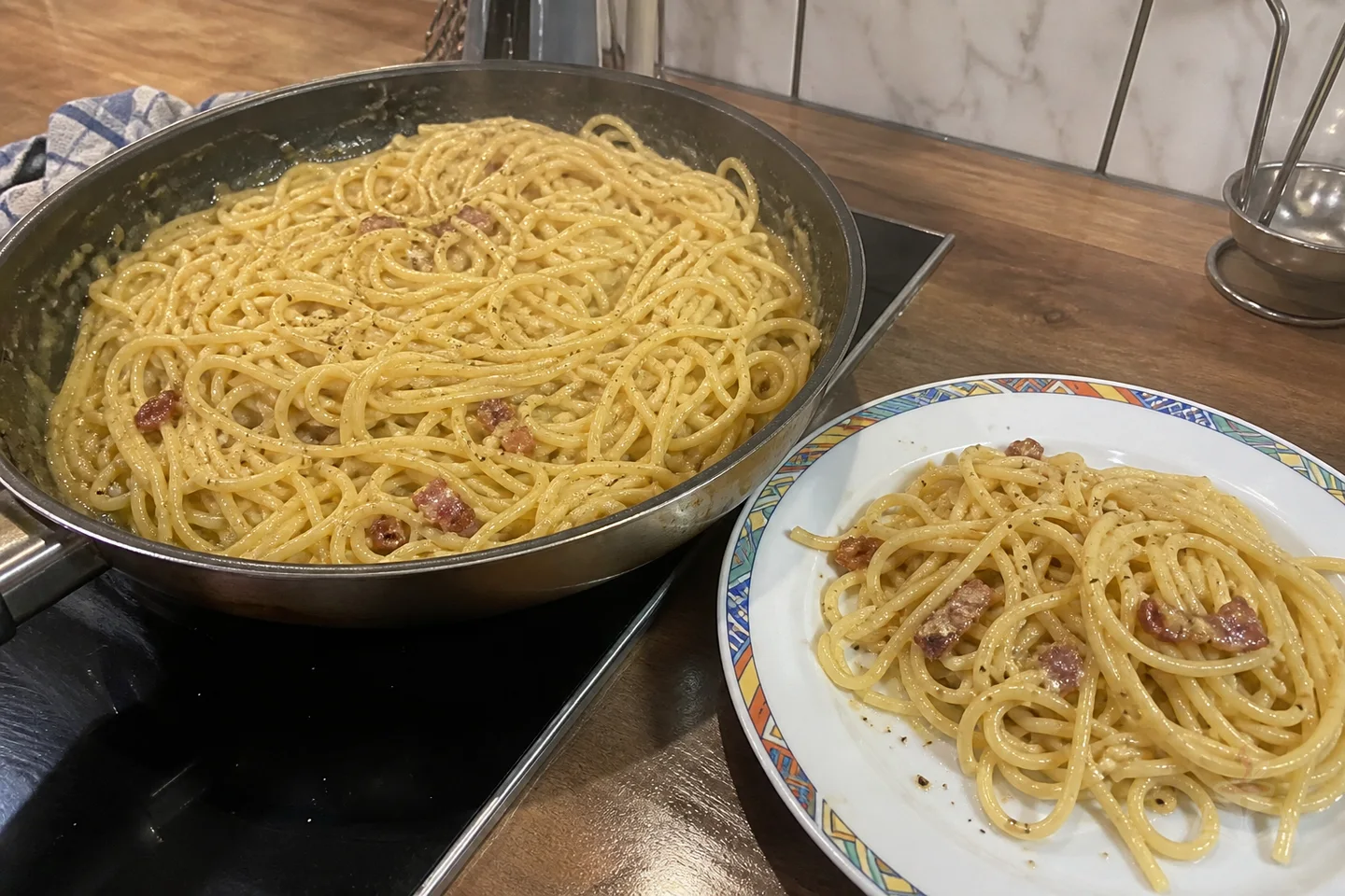 Spaghetti carbonara with guanciale, pecorino, and black pepper