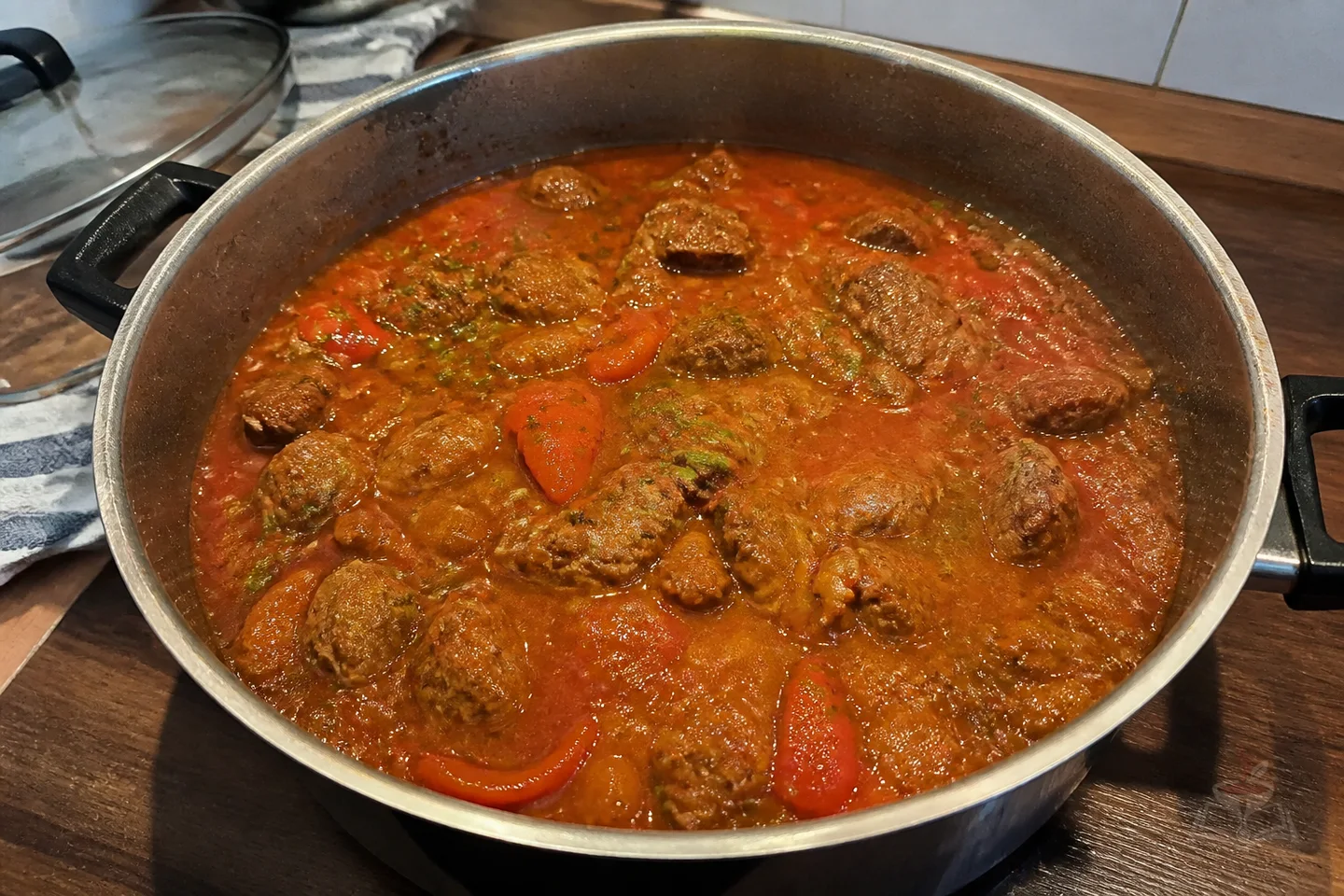 Georgian chashushuli beef stew with tomatoes, peppers, and cilantro